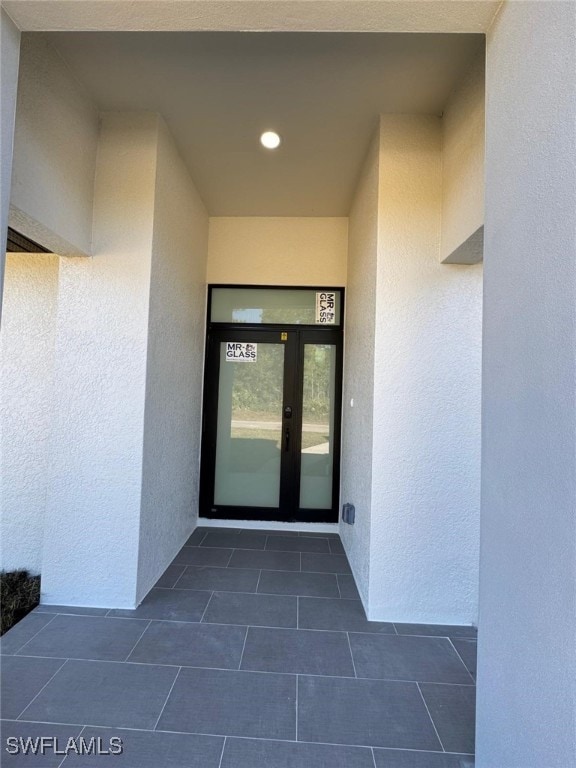 property entrance with french doors