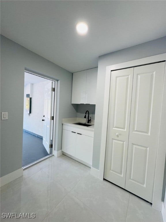 laundry area featuring sink