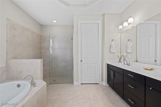 bathroom featuring tile patterned flooring, vanity, crown molding, and independent shower and bath