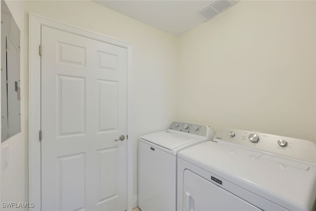 laundry room featuring washing machine and dryer