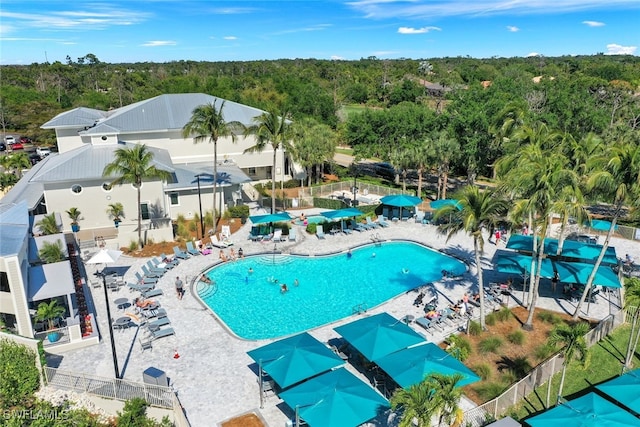 view of swimming pool featuring a patio area