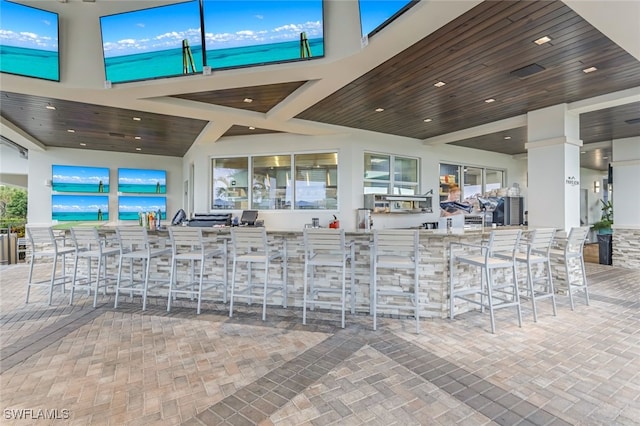 view of patio / terrace featuring an outdoor bar