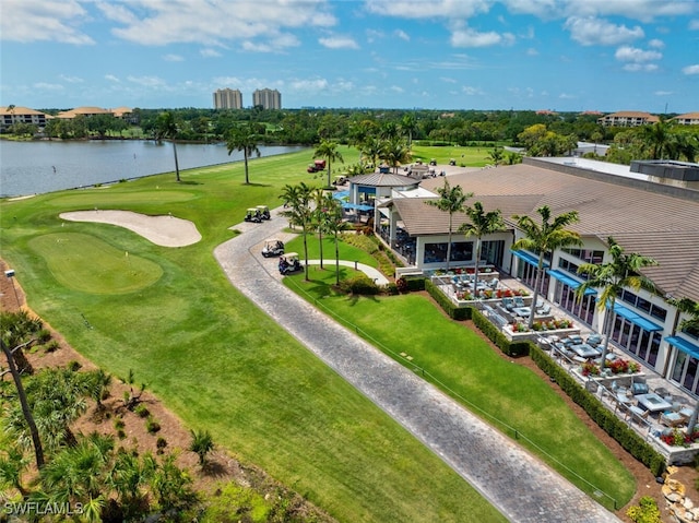 bird's eye view featuring a water view and golf course view