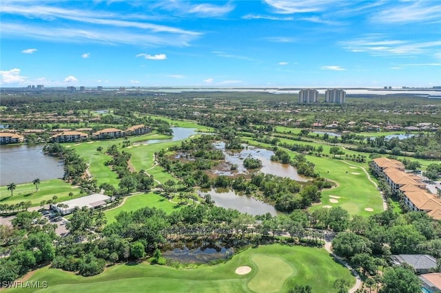 20944 Island Sound Cir Unit 101, Estero, FL 33928 - aerial view of residential area with a large body of water, a local golf course, and a tree filled landscape