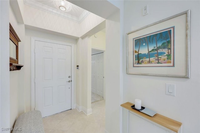 20944 Island Sound Cir Unit 101, Estero, FL 33928 - entrance foyer with light tile patterned floors, ornamental molding, and baseboards