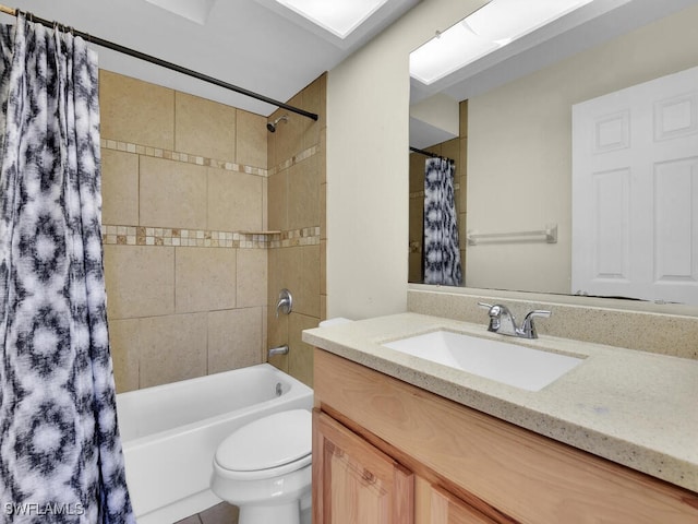 full bathroom with shower / bathtub combination with curtain, vanity, and toilet