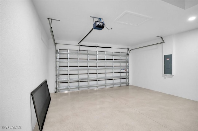 garage with electric panel and a garage door opener