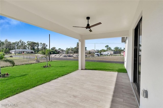 view of patio / terrace featuring ceiling fan