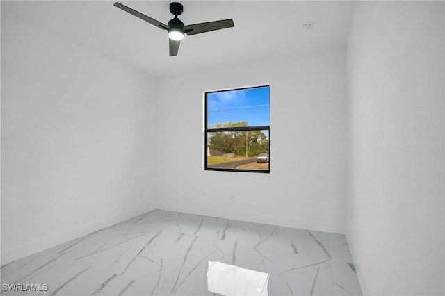 unfurnished room with ceiling fan