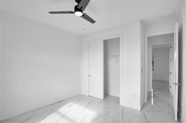 unfurnished bedroom with a closet and ceiling fan