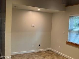 spare room featuring light hardwood / wood-style floors