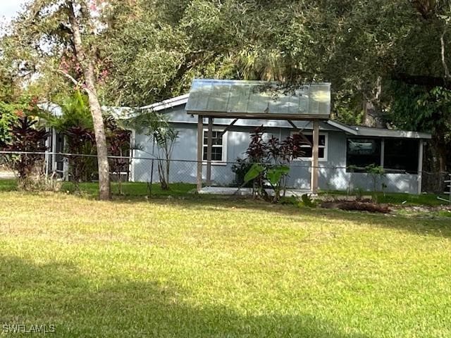 exterior space with a lawn