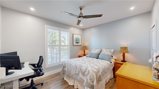 bedroom featuring baseboards, recessed lighting, and light wood-style floors