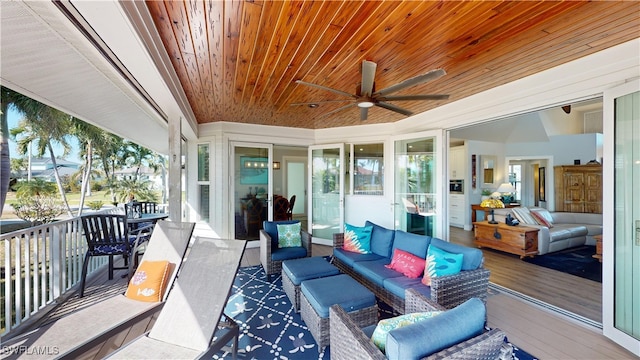 view of patio featuring ceiling fan and an outdoor living space