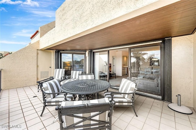 view of patio / terrace with a balcony