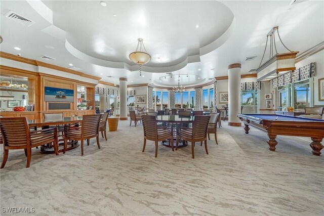 dining area featuring a raised ceiling, crown molding, light carpet, and pool table