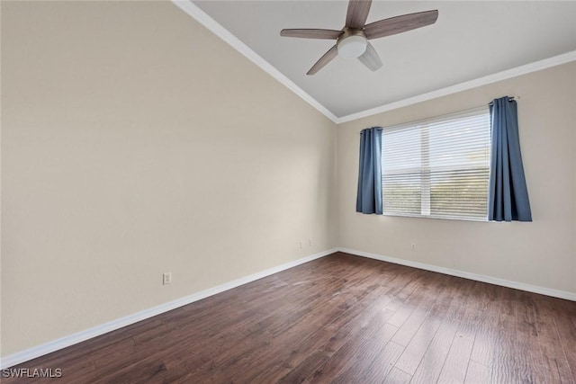 empty room featuring ornamental molding, dark hardwood / wood-style flooring, ceiling fan, and lofted ceiling