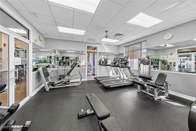 workout area with a drop ceiling