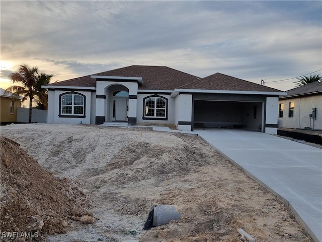 view of front of property with a garage