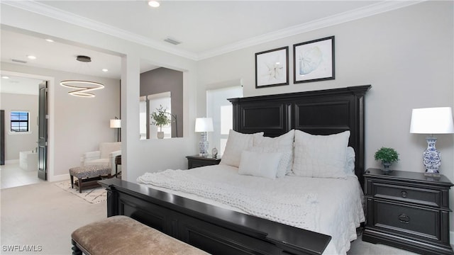 carpeted bedroom featuring ensuite bathroom and crown molding