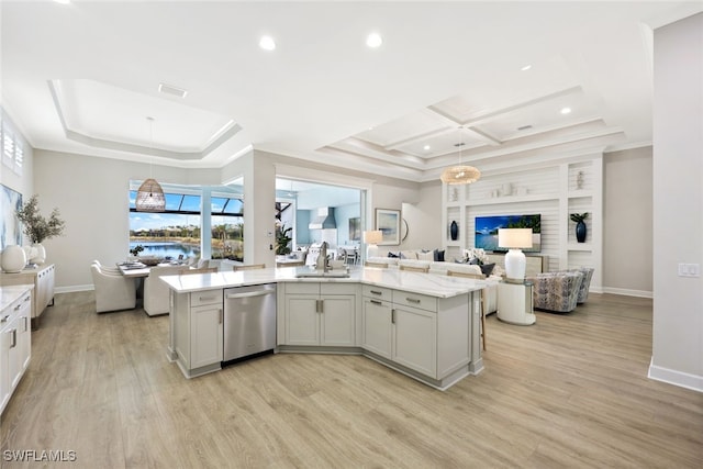 kitchen featuring gray cabinetry, open floor plan, dishwasher, light wood-type flooring, and a sink