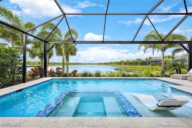 view of pool featuring glass enclosure, an in ground hot tub, and a water view