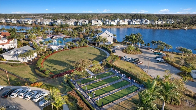 birds eye view of property featuring a residential view and a water view