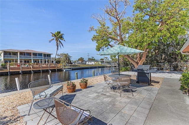 view of patio / terrace with a water view