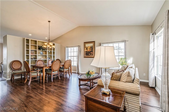 living room with built in features, lofted ceiling, an inviting chandelier, and dark wood-type flooring