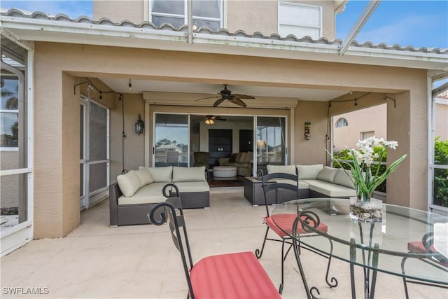 view of patio featuring an outdoor living space and ceiling fan