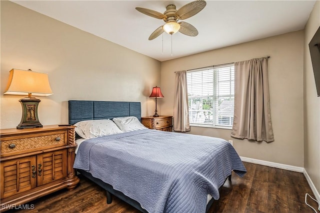 bedroom featuring dark hardwood / wood-style floors and ceiling fan