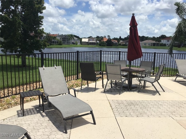 view of patio featuring a water view