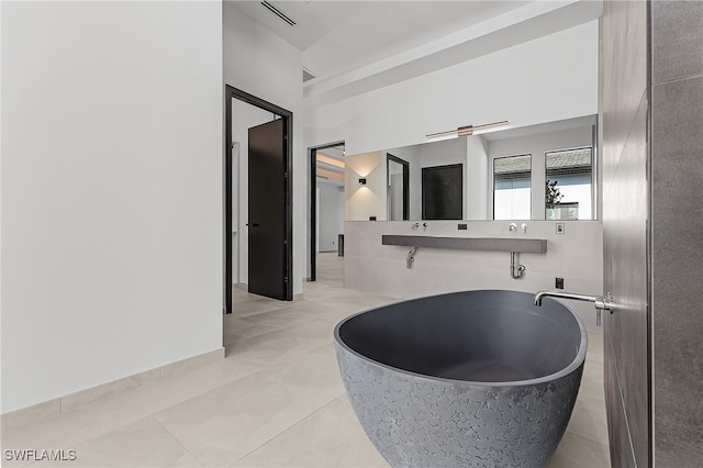 bathroom with tile patterned flooring