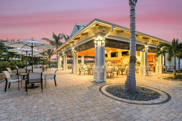 view of patio terrace at dusk