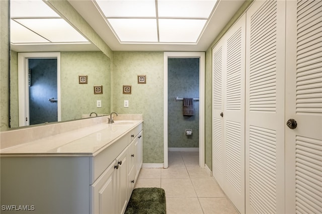 bathroom with vanity and tile patterned floors