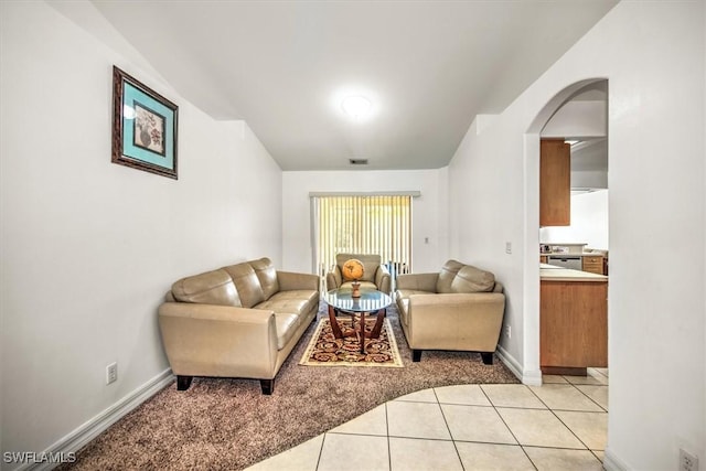 living room with light tile patterned flooring