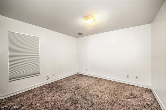 unfurnished room featuring carpet floors