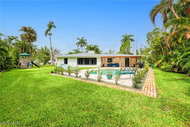 exterior space with a yard and a patio