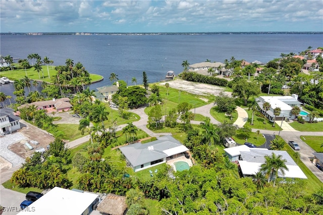 bird's eye view with a water view