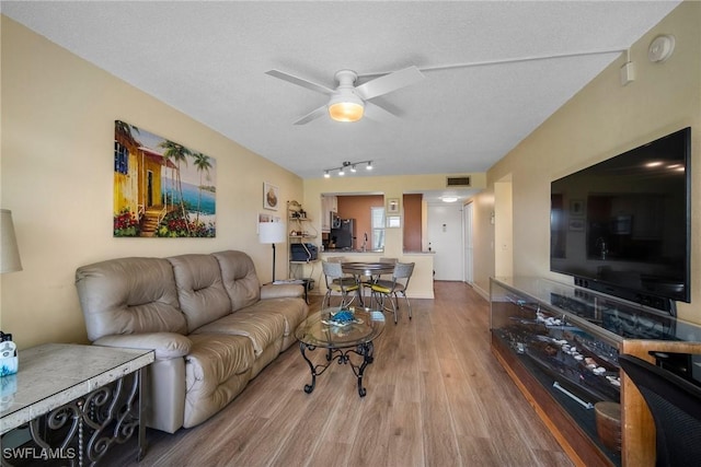 1724 Pine Valley Dr Unit 209, Fort Myers, FL 33907 - living room featuring wood finished floors and a ceiling fan