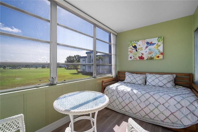 bedroom with hardwood / wood-style flooring