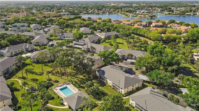 aerial view with a water view and a residential view