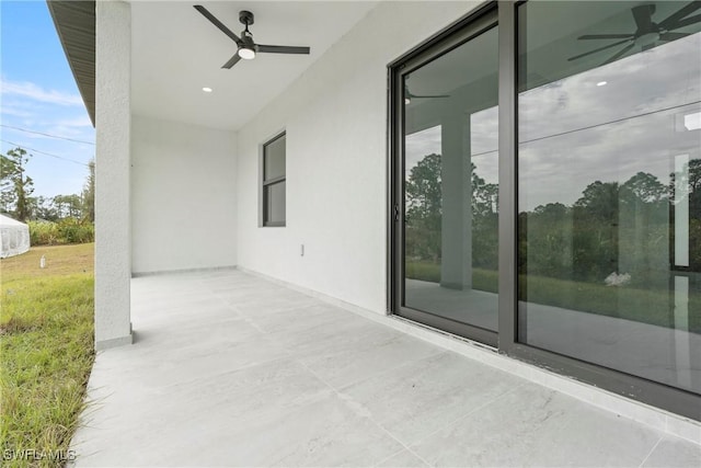 view of patio / terrace with ceiling fan