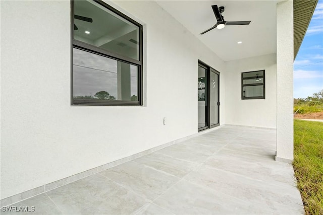 view of patio / terrace with ceiling fan