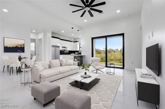 living room featuring ceiling fan