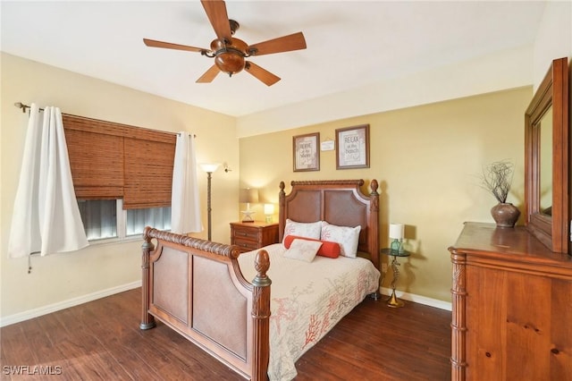 bedroom with ceiling fan and dark wood-type flooring