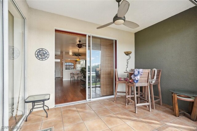 view of patio / terrace featuring ceiling fan