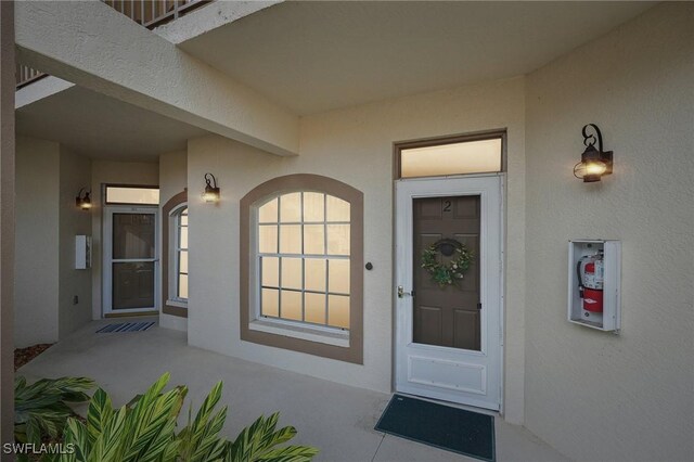 entrance to property with a porch