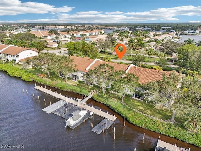 aerial view with a water view and a residential view