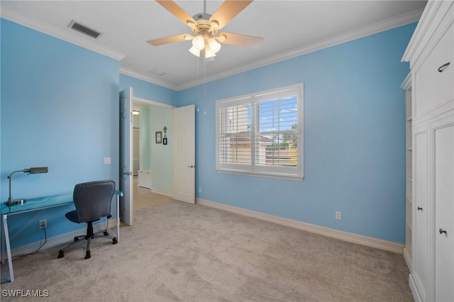 carpeted office with ceiling fan and ornamental molding